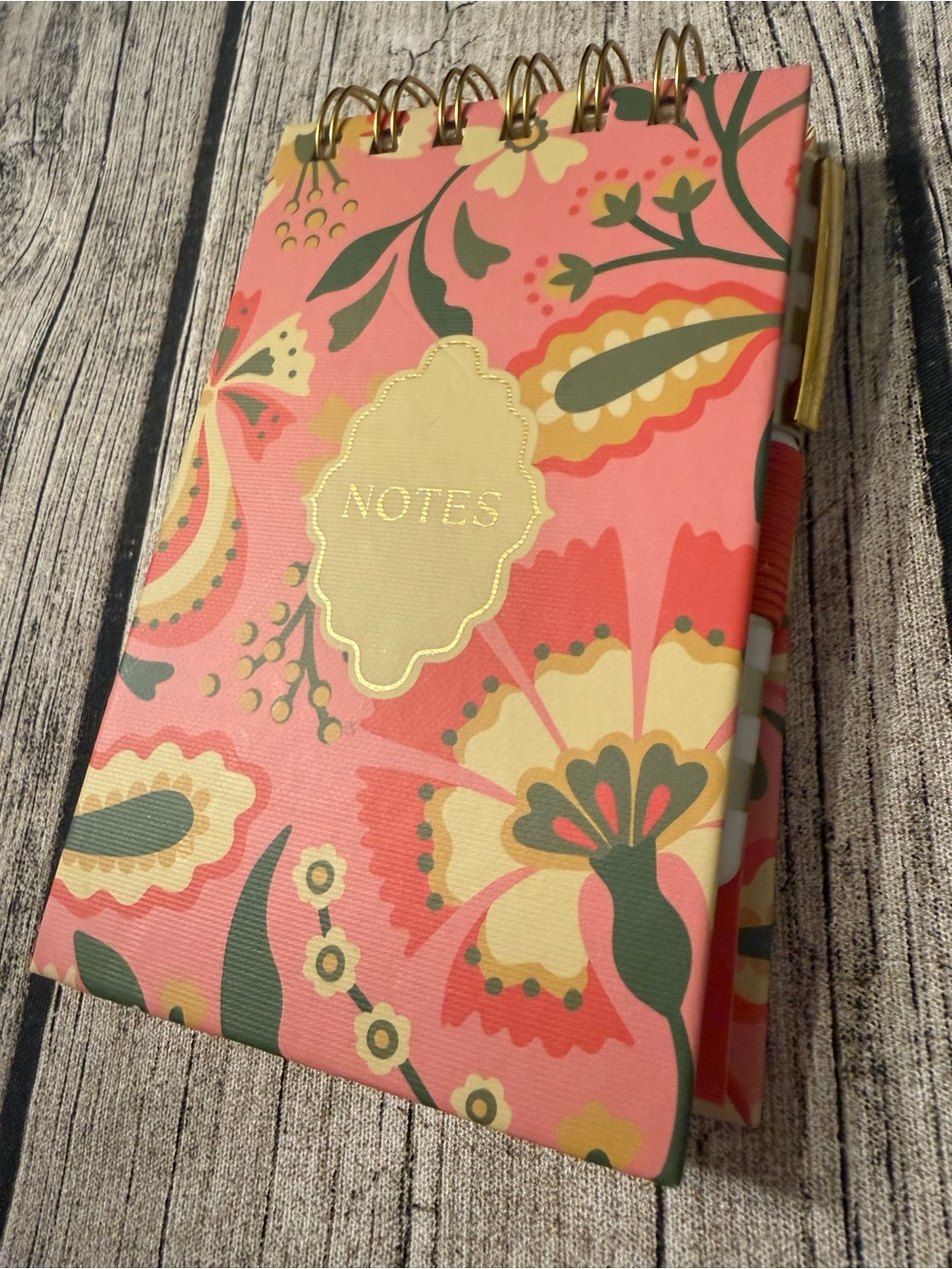 NWT. Hardcover lined spiral notebook with pen and holder in pretty floral